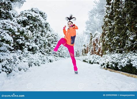 Winter Workout, Winter Fitness, Exercising in Cold Weather. Sportswoman Doing Stretching ...