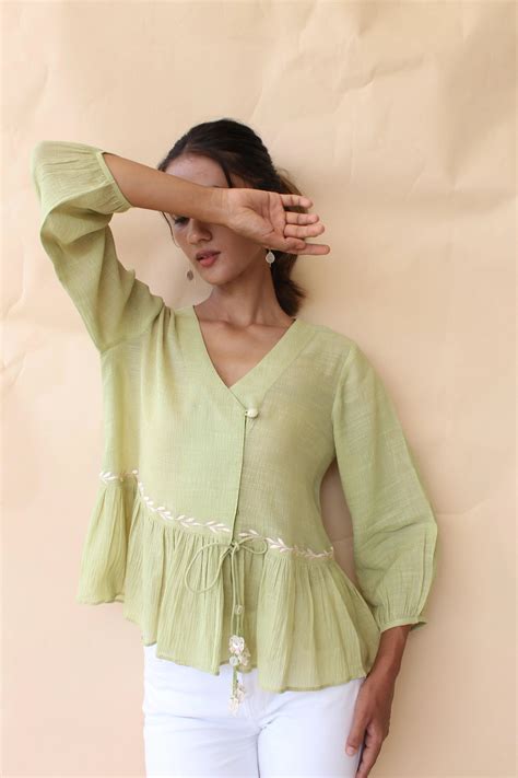 Tea green crinkle cotton crossover peplum top – Sohni