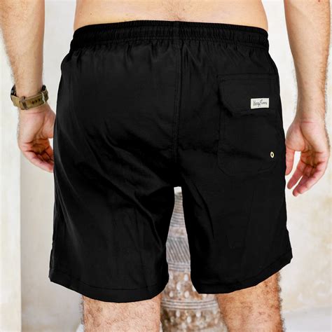 The Midnight Dips | Solid Black Men's Swim Trunks by Kenny Flowers