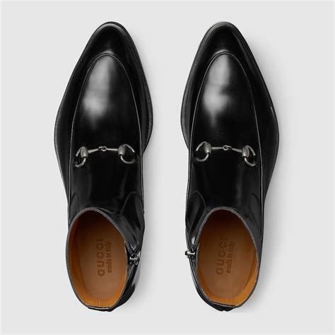 Stivaletto uomo con Morsetto in pelle nera | GUCCI® CH