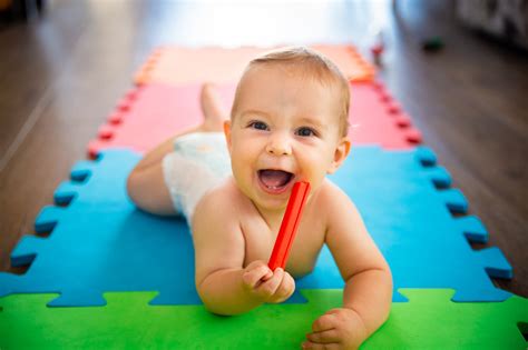 When Do Babies Roll Over? | POPSUGAR Family