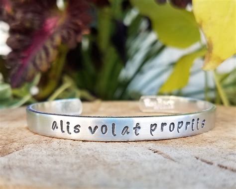Alis Volat Propriis 1/4" Aluminum Hand-Stamped Bangle | RooBarb Studios