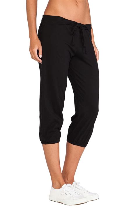 SOLOW So Low Dance Crop Pant in Black | REVOLVE