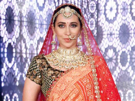 You can't miss Karisma Kapoor's latest look as a Rajasthani bride!
