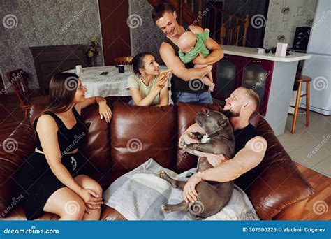 Young Married Couple with Baby Girl and Husband and Wife with Dog Met ...