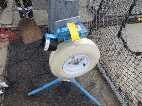 Image result for How to Use a Pitching Machine