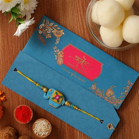 Send Blue Elephant Kids Rakhi & Rasgulla Tin - Dubai Online ...