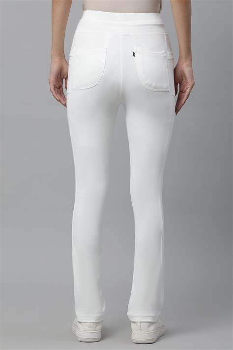 Buy Elleven Women's White Solid Boot Cut Pants With Drawstring Online ...