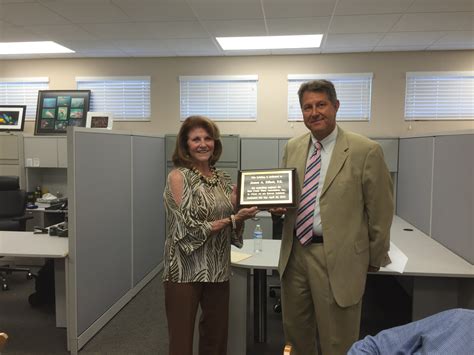 Anna Elliott receiving plaque on behalf of family | Bear Creek Water ...