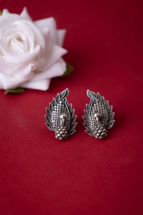 Moh Peacock Intricate Embossed Studs
