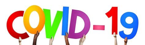 Covid19 human hands holding colorful letters | Premium Photo
