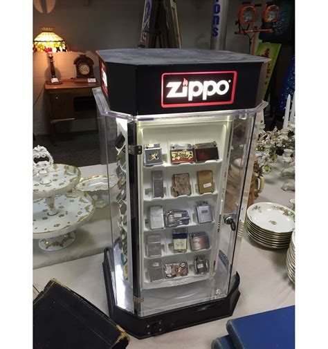 COLLECTION OF 46 VINTAGE LIGHTERS WITH ZIPPO DISPLAY CASE - Able Auctions