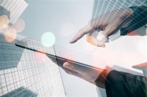 Close up of business man hand using smartphone on blurry bokeh city ...