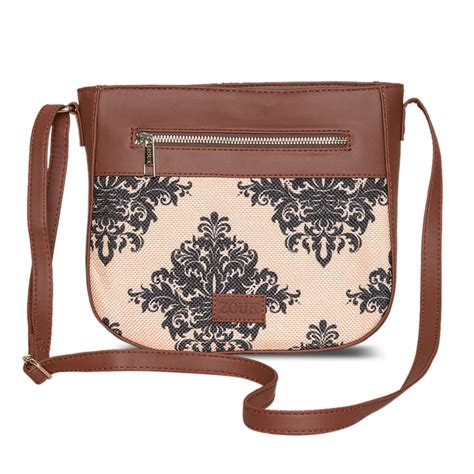 ZOUK Women's Handcrafted Cream Mughal Motif Printed U Shaped Sling Bag ...