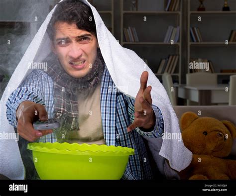 Sick man doing inhalation at night in home Stock Photo - Alamy