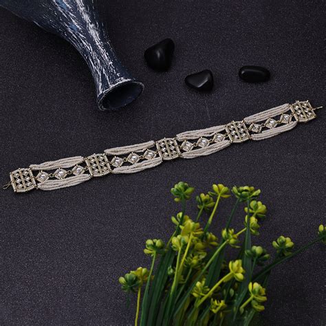 Sukkhi Stunning White Gold Plated Pearl Ethnic Shishphool For Women ...