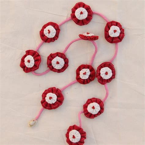 Gajra and parandi: Shop red floral parandi online at bebaakstudio.com ...