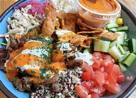 Signs of life at Spitz in Leesburg as sign is installed