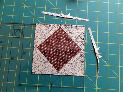 How to Use a Quarter Square Triangle Ruler for Quilting 的图像结果