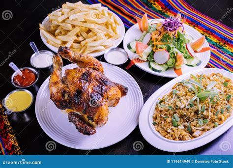 Peruvian Food: Pollo a La Brasa Con Arroz Chaufa Stock Image - Image of ...