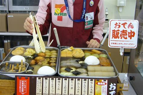 Oden sold at a Japanese convenience store, displayed in a hot counter with various skewered ingredients.