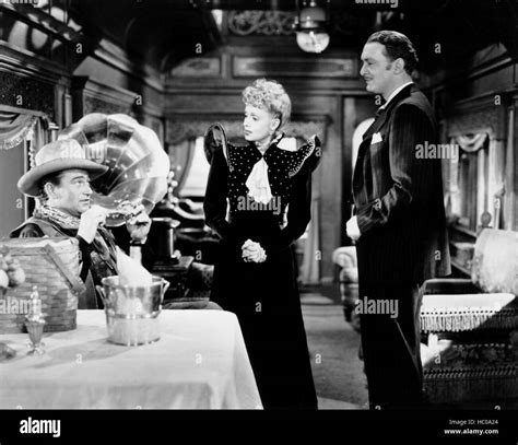 IN OLD OKLAHOMA, (aka WAR OF THE WILDCATS), from left, John Wayne ...