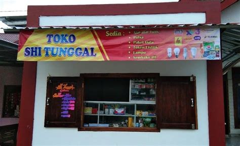 cara pasang spanduk toko