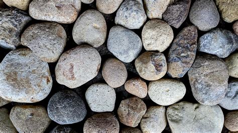round stone gravel texture for background, natural pebble texture ...