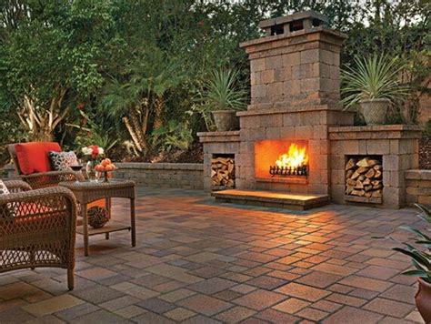 https://www.angeluspavingstones.com/wp-content/uploads/2017/02/rustic-wall-fireplace-tuscan-courtyard-stone-ashlar-m.jpg