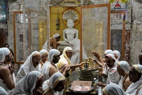 Devotees from Jain Community offer their prayers on the occasion of ...
