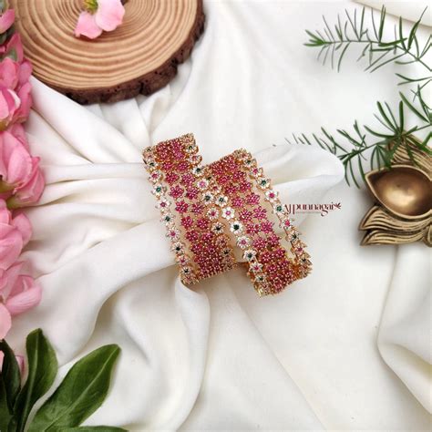 Mesmerizing floral AD Stone Combo Bangle Set of 8 – AJ Punnagai