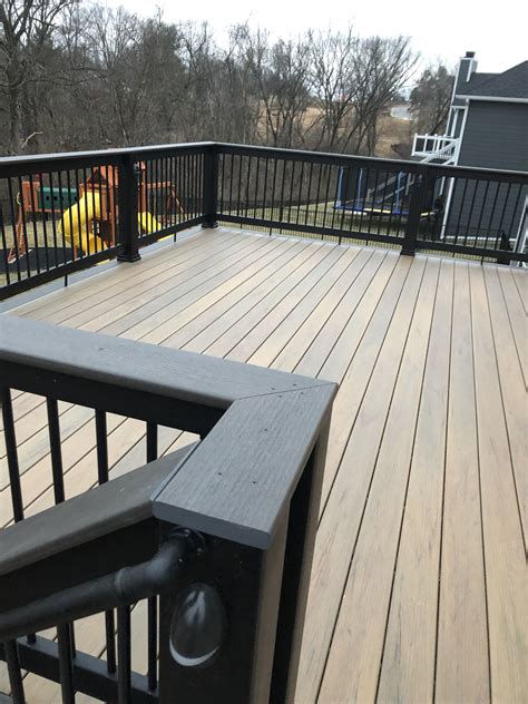 Modern Patio Deck with Black Railings