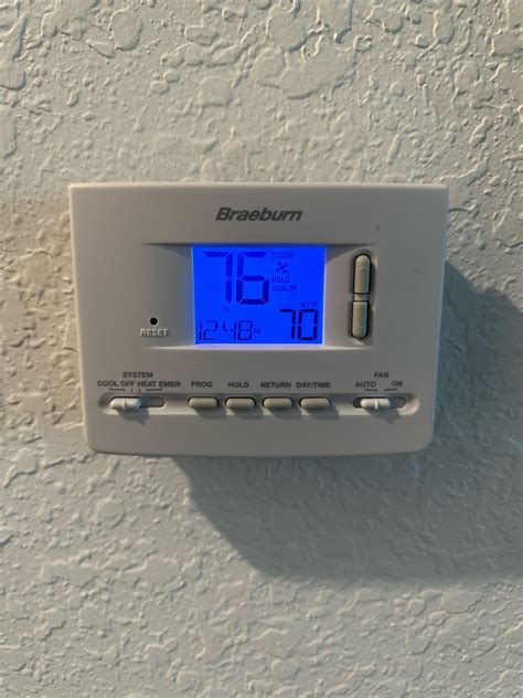 Why is it that I have my thermostat set at 70 but yet its displaying ...