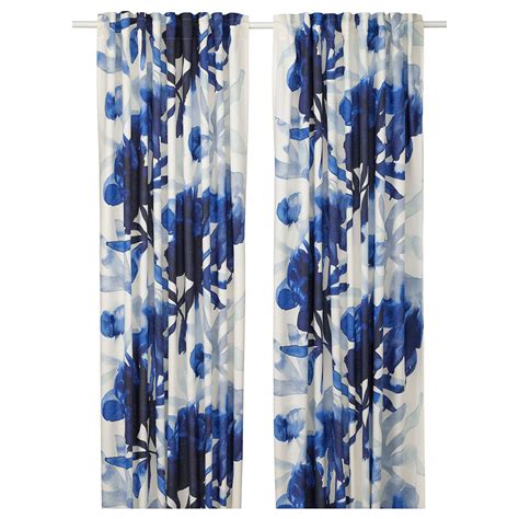 SKOGSNÄSSLA curtains, 1 pair, white/blue floral pattern/with heading ...