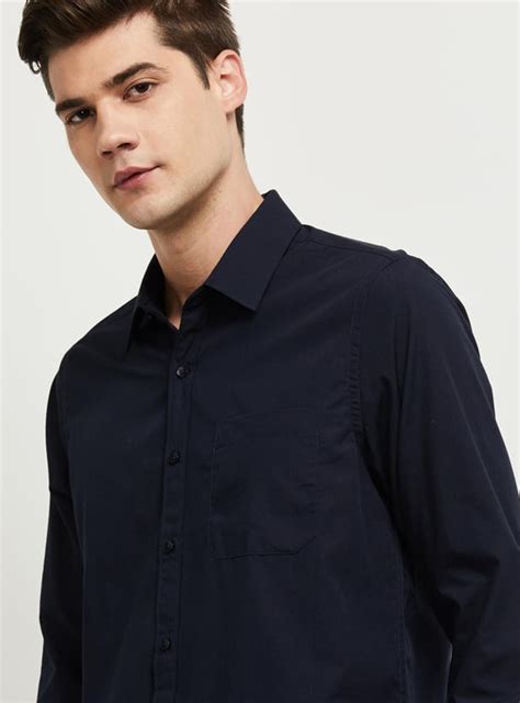 Buy Men Solid Slim Fit Formal Shirt Online at just Rs. 699.0 ...