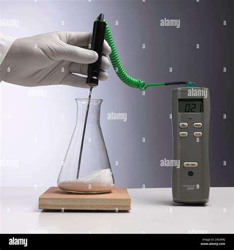 Start of an endothermic reaction. Solid barium hydroxide and solid ...