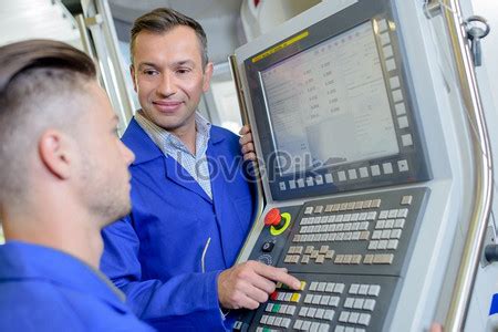 The Machine Operator Just Watching Another Machine Operator Working 的图像结果