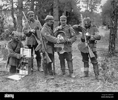 Germany: c. 1916 German soldiers with one of their country's latest inventions, a portable ...