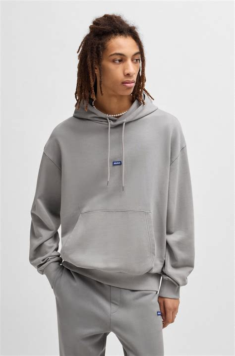 HUGO - Cotton-terry tracksuit set with blue logo patches - Light Grey