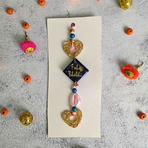 Buy Purple Resin Couple Rakhi For Bhaiya Bhabhi – ClassyArtZ.com