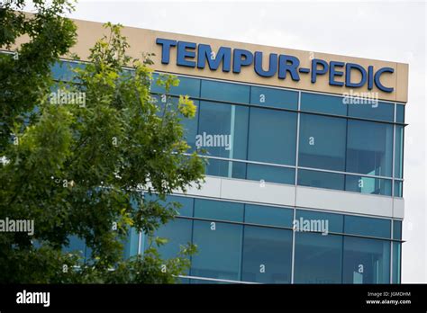 A logo sign outside of the headquarters of Tempur Sealy International ...