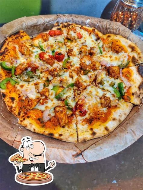 Menu at heavenly crust - wood fired pizzas on truck, Reis Magos