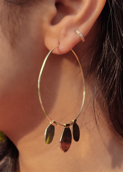 Get Charm Detail Gold Hoops With Mirror Finish at ₹ 1300 | LBB Shop
