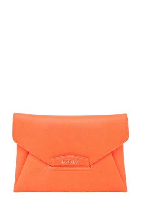 Givenchy Antigona Envelope Clutch in Bright Orange | FWRD