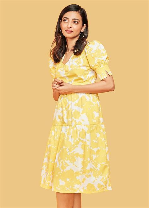 Get Puffed Sleeve Detail Yellow Printed Layered Midi Dress at ₹ 1395 ...