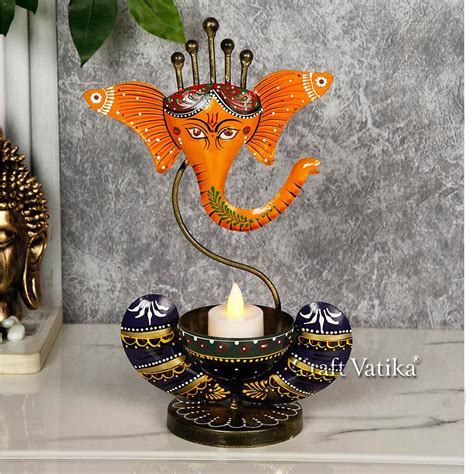 Buy Online Metal Ganesha Idol Tealight Candle Holder Stand Showpiece ...