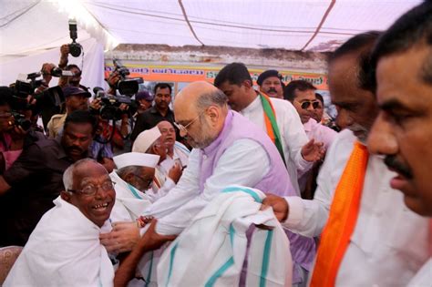 Photo : BJP National President, Shri Amit Shah felicitating the ...