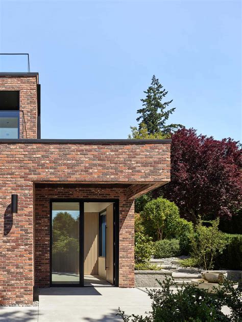 This Modern Brick House Terraces Down The Hillside - Architecture ...