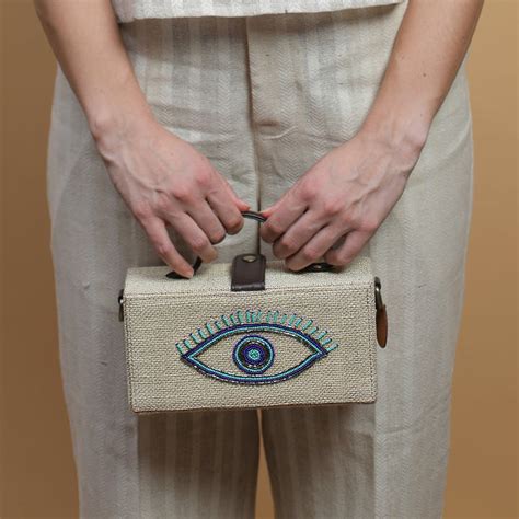 Evil eye hand embroidered jute clutch bag – GoneCase