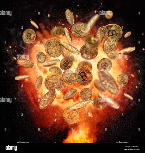 Fire explosion of Bitcoins crypto currency symbol, isolated on black background. Concept of ...